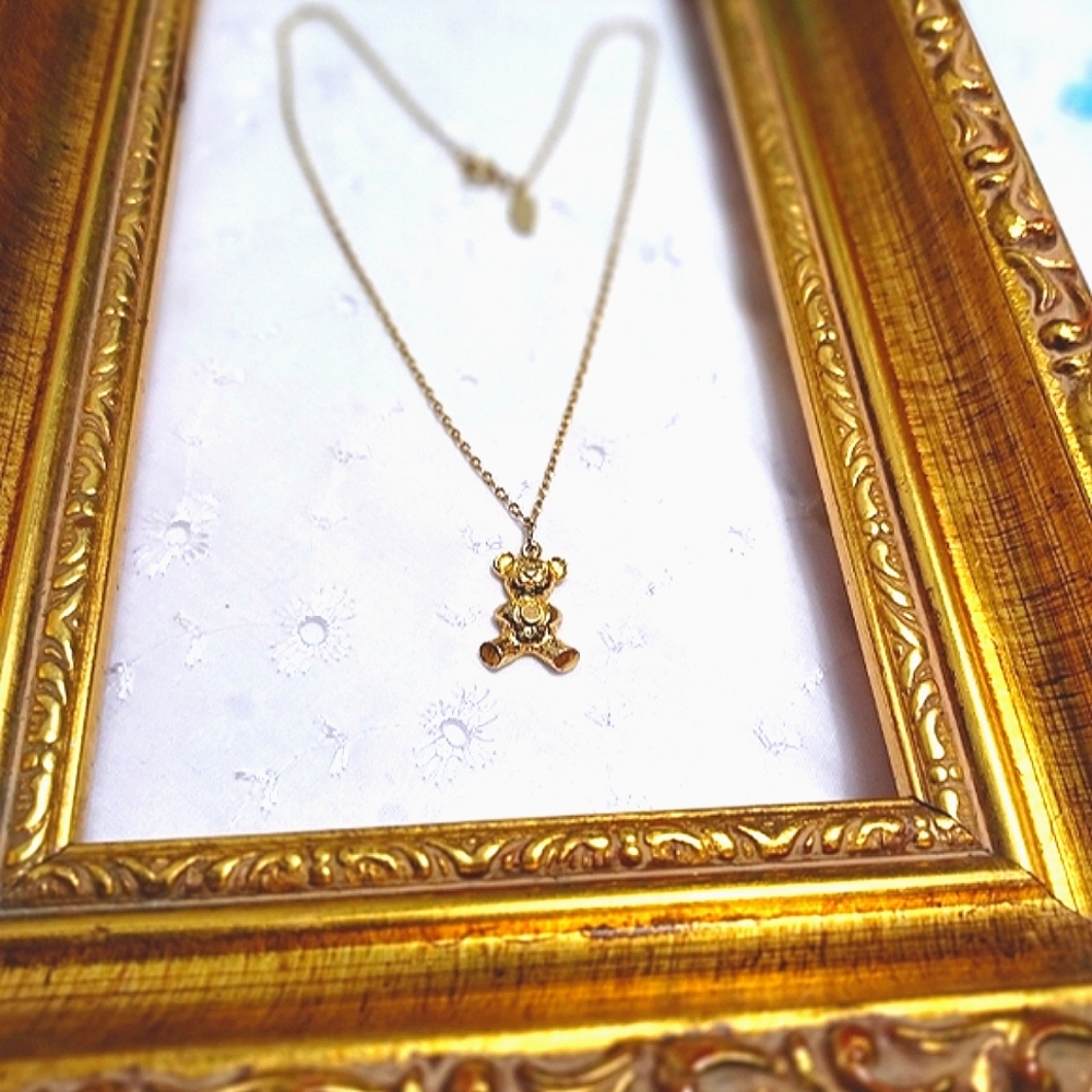 Park Lane, children's size, gold necklace with teddy bear charm holding a pearl